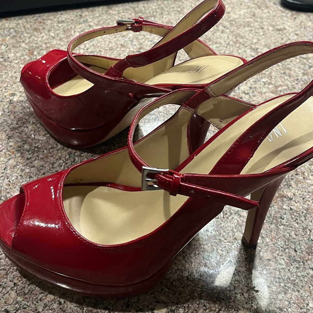 Red “INC” Heels